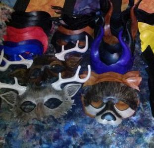 Leather masks, base dyed, in process.